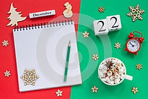 calendar December 22nd cup cocoa and marshmallow, empty open notepad
