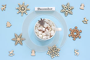 calendar December Mug cocoa marshmallows and large wooden snowflakes