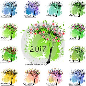 Calendar grid for 2017 year with abstract tree