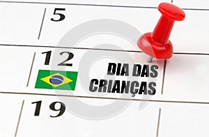 On the calendar grid, the date and name of the holiday - October 12 - Brazil - Children's Day