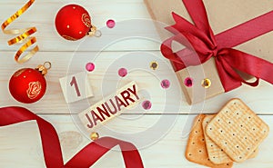 Calendar January 1, symbol of the new year. Red Christmas decorations