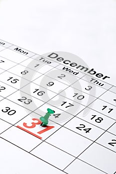 A calendar with New Year's day marked with a g