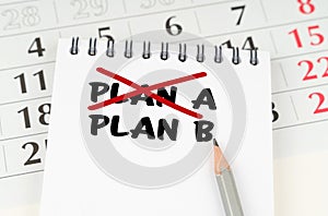 On the calendar is a notebook with the inscription - Plan A Plan B