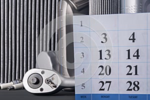 Calendar with numbers for recording on car maintenance, consumables concept photo
