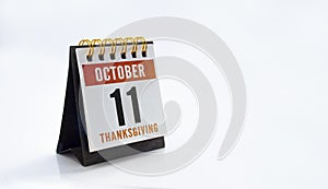 A calendar with October 11 during thanksgiving on a white background