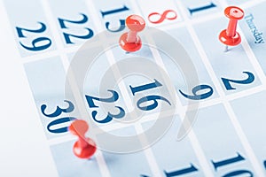 Calendar page for 2021, Concept image of a calendar with red push pins