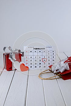 Calendar page with a red hand written heart highlight on February 14 of Saint Valentines day