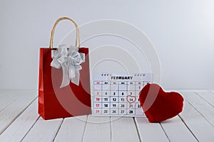 Calendar page with a red hand written heart highlight on February 14 of Saint Valentines day