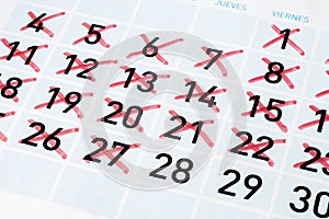 Calendar page with strikethrough days