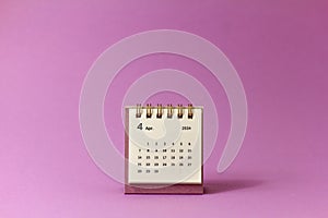 Calendar for planning for April 2024 on a pink background