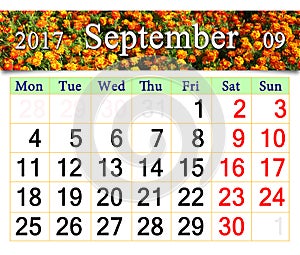 Calendar for September 2017 with marigolds