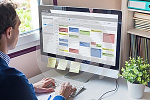 Calendar software showing busy schedule of manager with many meetings, tasks and appointments during the week, time management