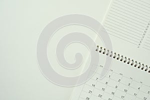 Calendar on the white table background, planning for business meeting or travel planning concept