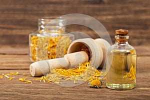 Calendula officinalis - Calendula Oil In A Glass Bottle photo