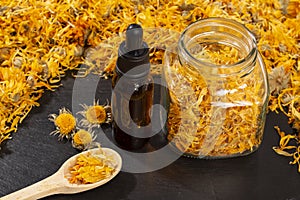 Calendula officinalis - Calendula Oil In Dark Cosmetic Dropper photo