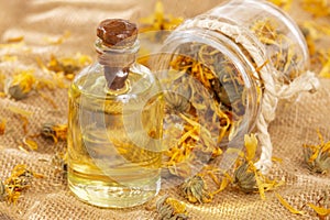 Calendula officinalis - Calendula Oil In A Glass Bottle photo