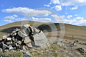 By Calfhow Pike summit cairn viewing path leading to Great Dodd