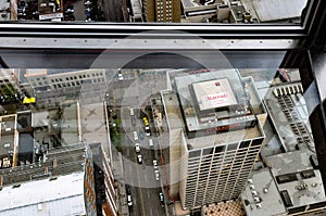 Calgary Marriott Downtown viewed through the glass floor of the Calgary Tower