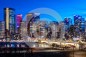 Calgary`s skyline at night on the Bow