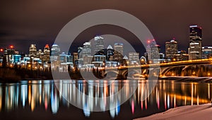 Calgary skyline at night with Bow River and Centre Street Bridge photo