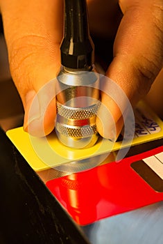 Calibration paint coating thickness tester with plastic shim photo