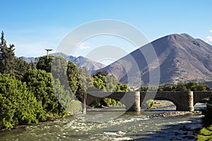 The Calicanto Bridge is located in the city of Huanuco, Peru, and crosses the Huallaga River.