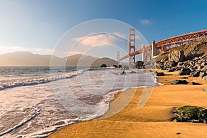 California beach and Golden Gate Bridge, San Francisco, California.