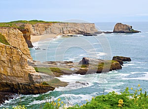 California coast cliffs with crashing waves