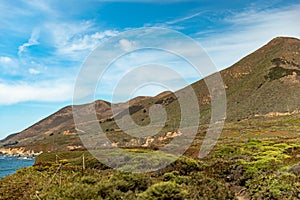 California coastline along US one. Rocky shores, majestic sky and blue waters