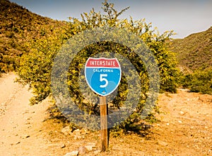 California interstate 5 traffic sign in front of desert thorn tr