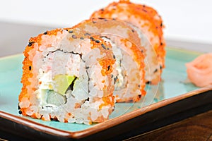 California maki sushi with orange masago