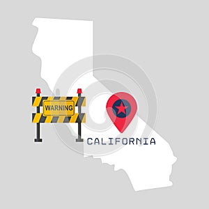 California map with warning sign barrier.