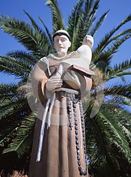 California Mission Friar with Child