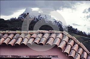 California Mission Pink tiled roof with Wood Cross