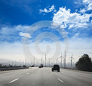 California road with electric windmills aerogenerators