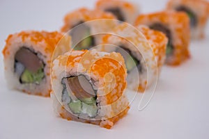 California Roll Sushi with Masago Close-up