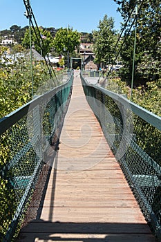Swinging footbridge in Arroyo Grande, California photo