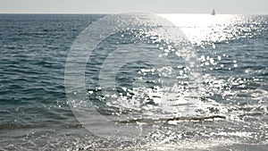 California summertime beach aesthetic, blurred defocused water wave. Shiny sun track and sunlight. Santa Monica pacific ocean