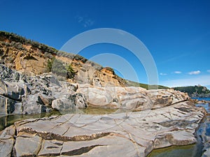 Calignaia wild rocky coast near Livorno in Italy