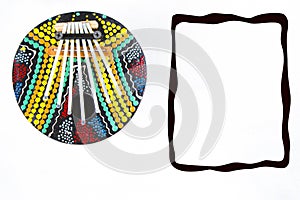 Calimba, colorful circle music instrument, with a black frame on white background