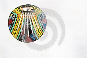 Calimba, colorful circle music instrument on white background