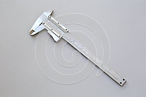 Caliper on a gray background insulated