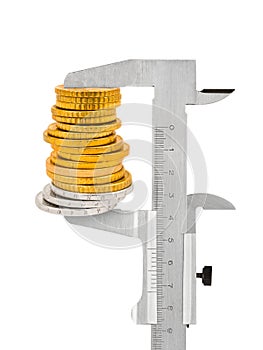 Calipers and stack of coins photo