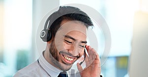 Call center agent consulting a buyer via video call in an office. A young friendly sales man talking to a client in a