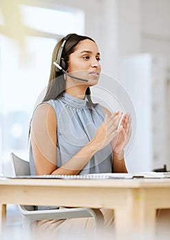 Call center agent, sales advisor and telemarketing employee listening to a client giving them their payment data. Call