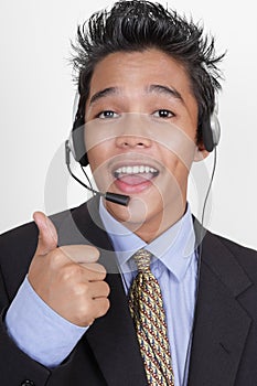 Call center agent thumbs up portrait