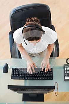 Call center agent typing while on a call