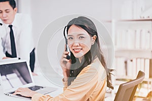 Call center asian woman operator working with headset at office,Employee women smiling face
