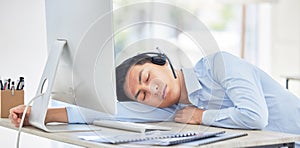 Call center, businessman and sleeping on desk and tired while being overworked and exhausted. Nap, rest and contact us