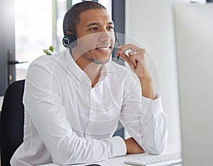 Call center, computer and consulting with man in office for customer service, contact us and sales. Help desk, operator